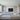 a living room with a couch and a television