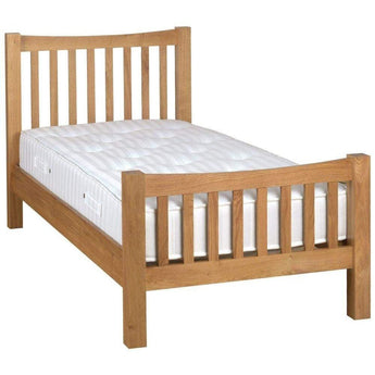 a wooden bed frame with a wooden headboard 