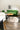 green sofa beside white table