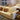 white sofa chair near white table lamp