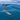 a person swimming with dolphins