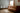 a living room with a couch and chairs