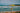 a sign on a beach that says 66