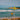 a sign on a beach that says 66